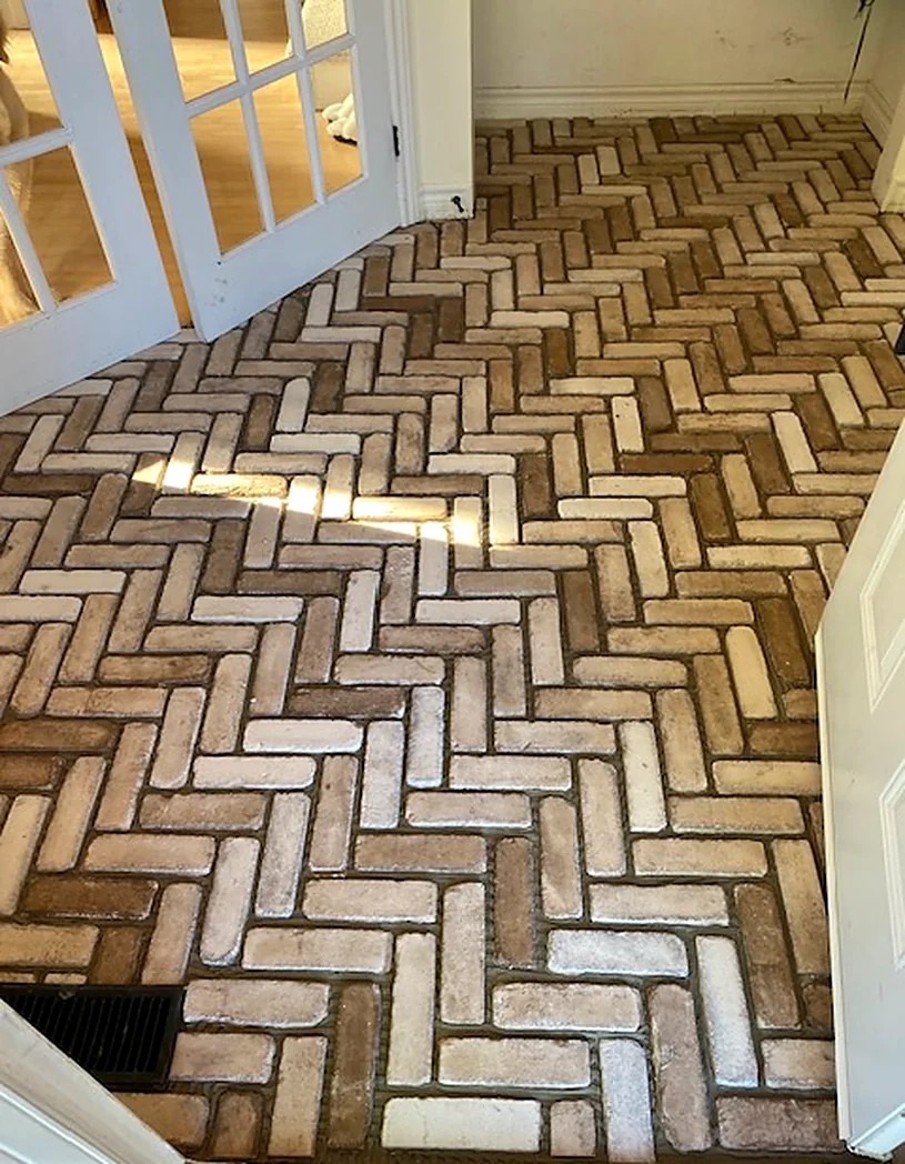 Reclaimed brick, laid herringbone