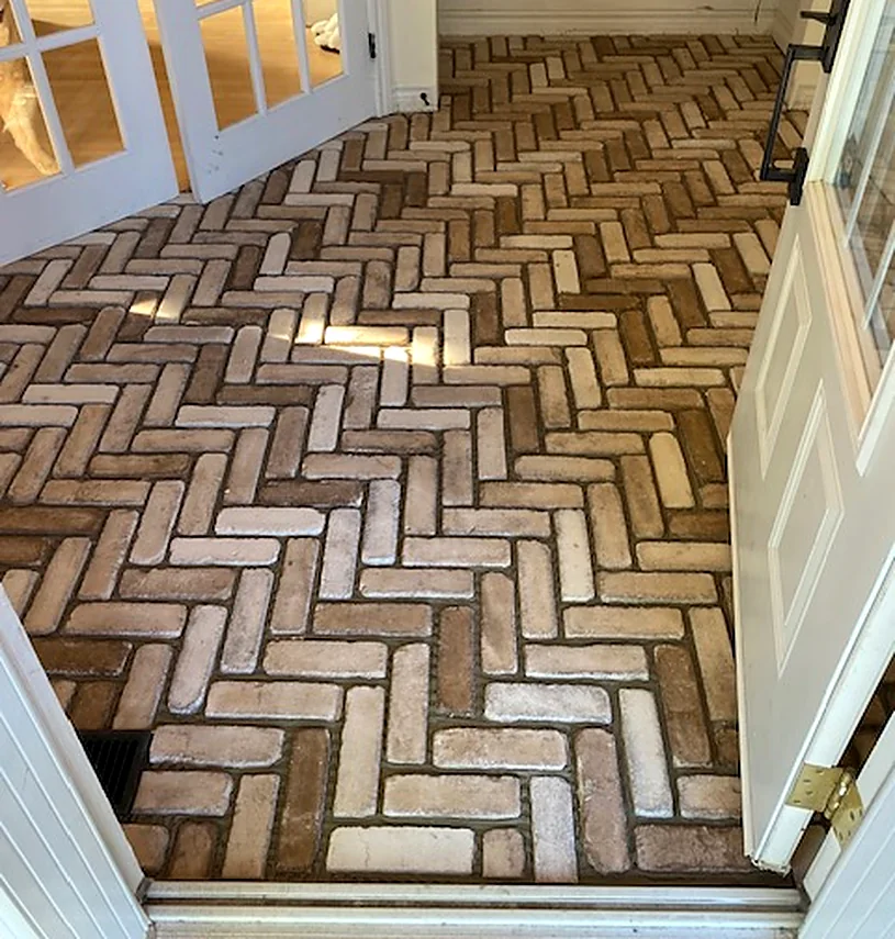 Reclaimed brick, laid herringbone
