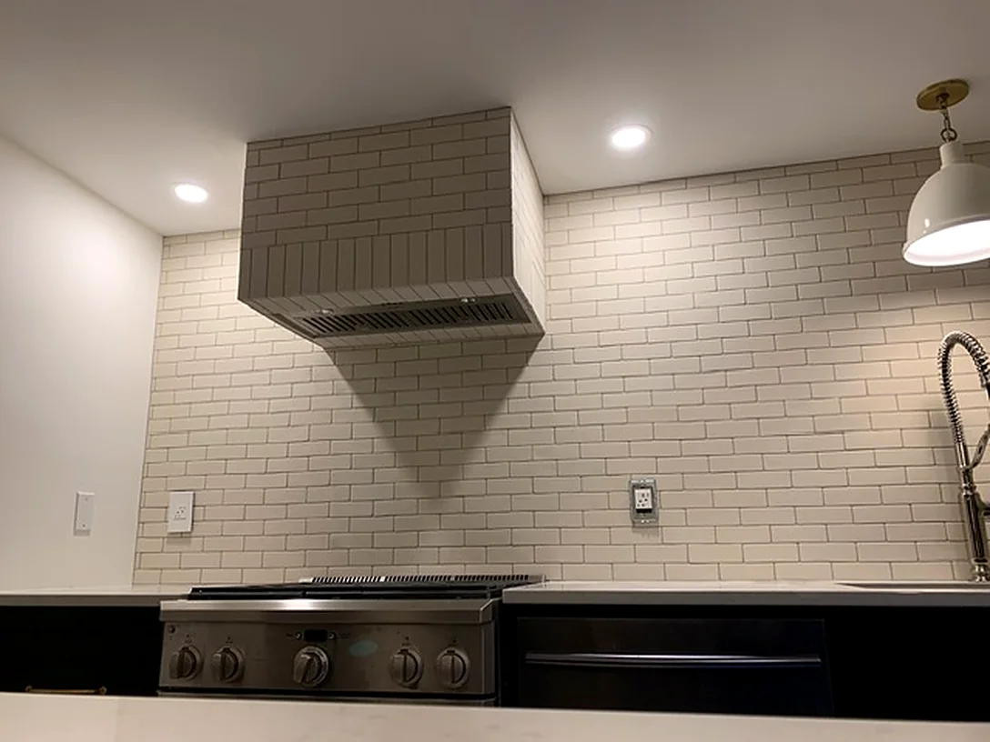 Handmade-look brick with a tiled hood