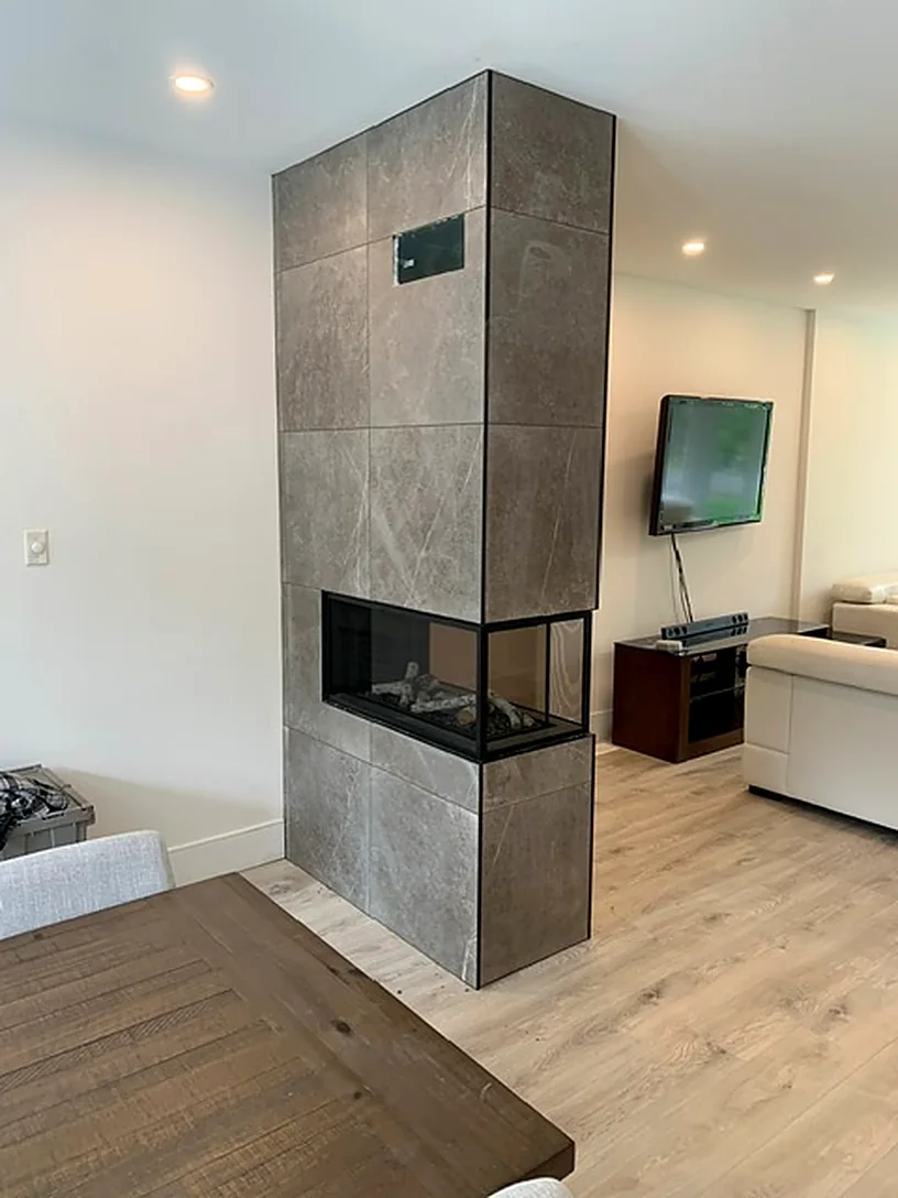 Grey slab with the TV recessed above
