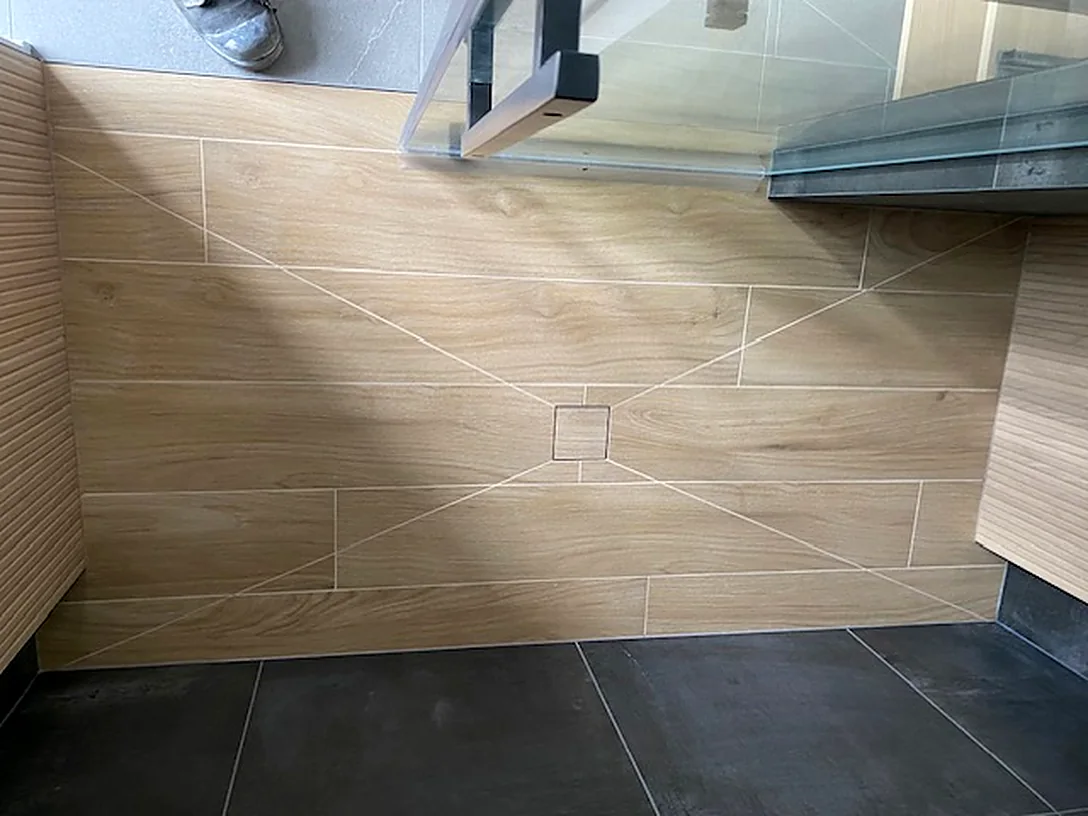 Wood-look plank carried into the shower