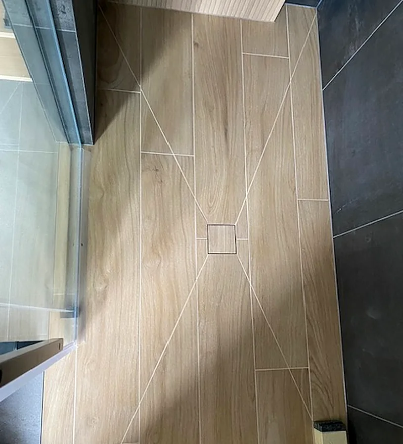 Wood-look plank carried into the shower